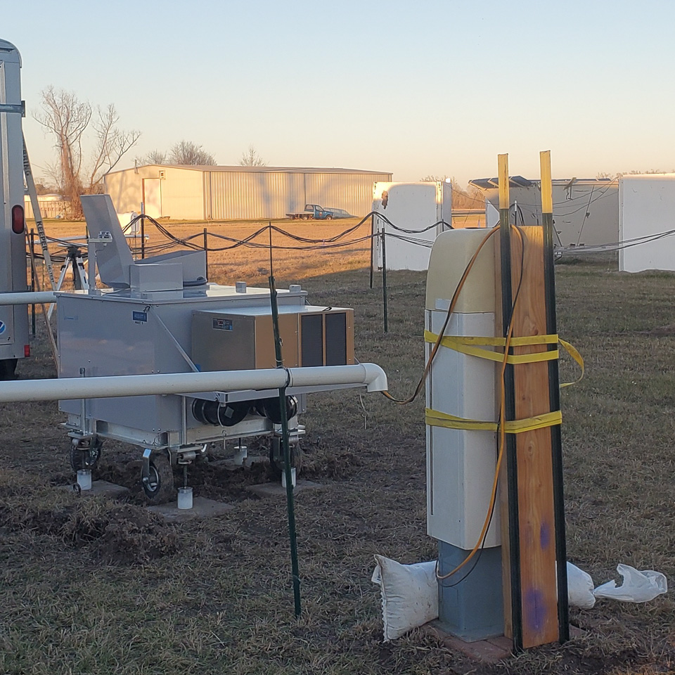 instrumentation cluster: metal boxes on a cart, box on a stand held in place by sandbags