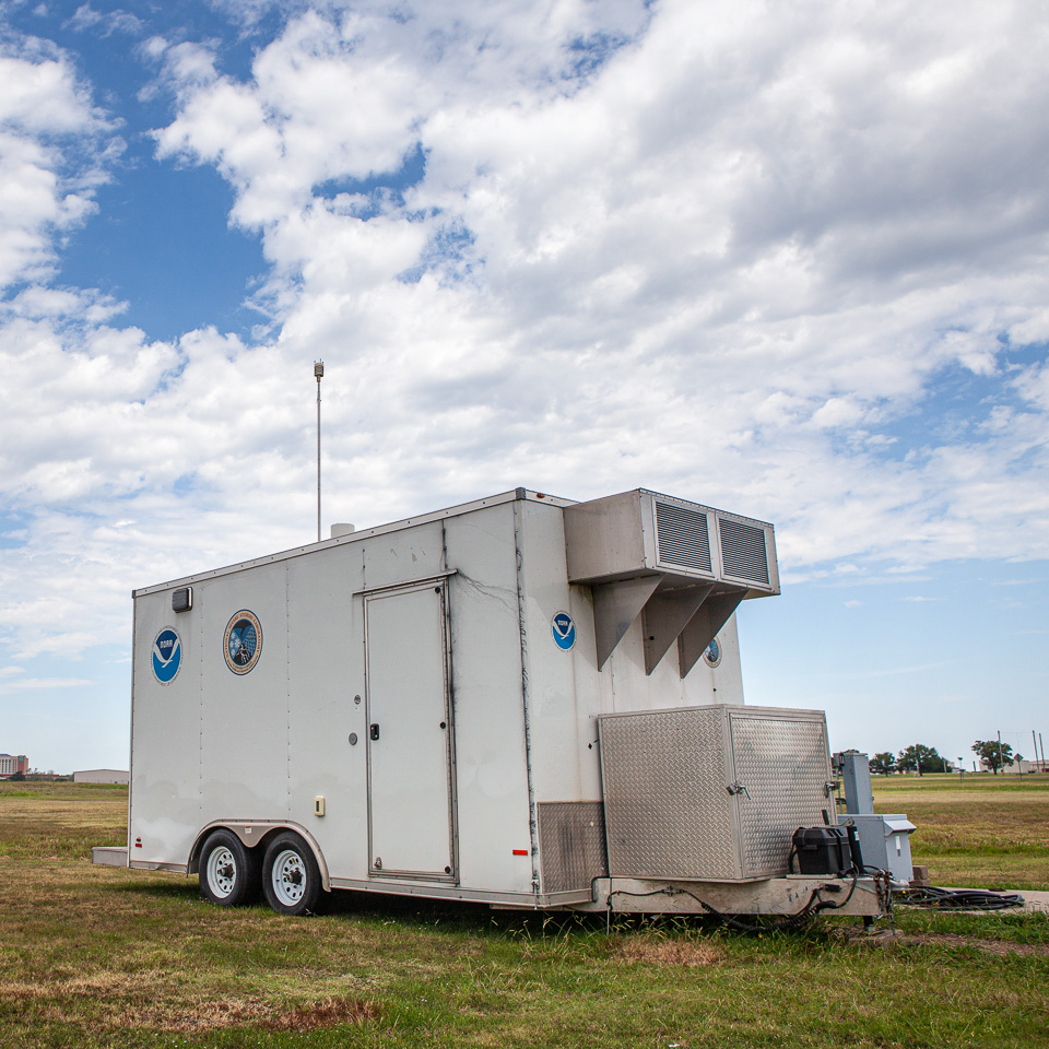 trailer with NOAA and NSSL logos in a field