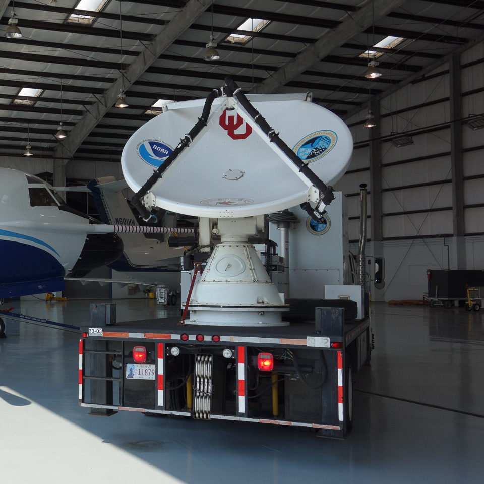 radar mounted on truck, in a hangar